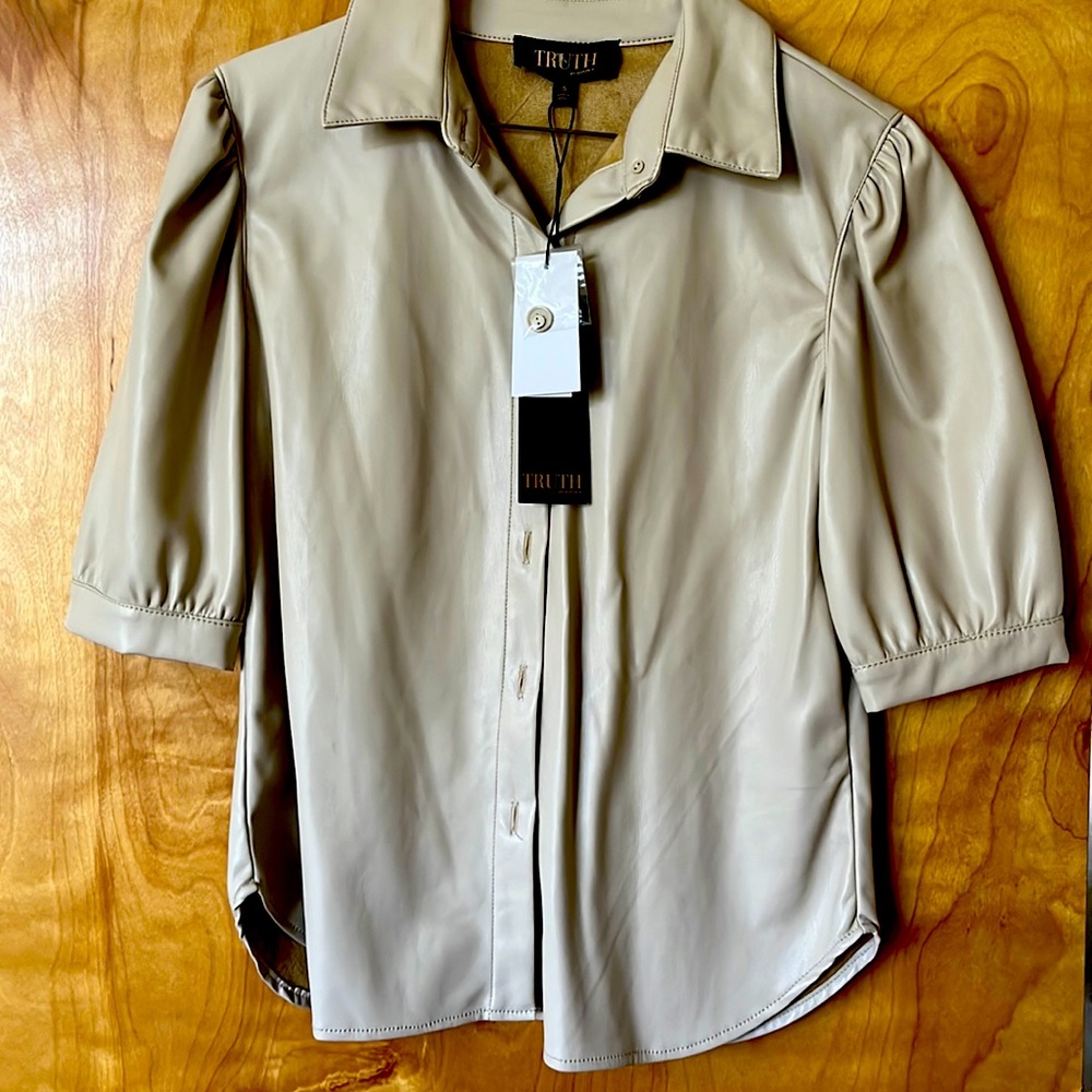 Elbow length puff sleeve vegan leather top